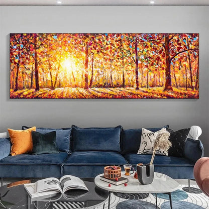 AUTUMN SUNRISE: Panoramic Forest Landscape Painting in Orange and Yellow | gold frame stretched on neutral wall