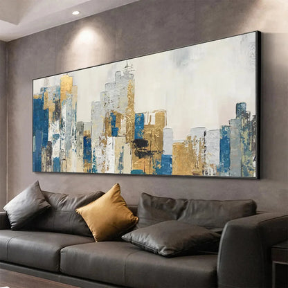 GOLDEN METROPOLIS: Abstract Cityscape Oil Painting in Gold and Blue | black frame version on white wall