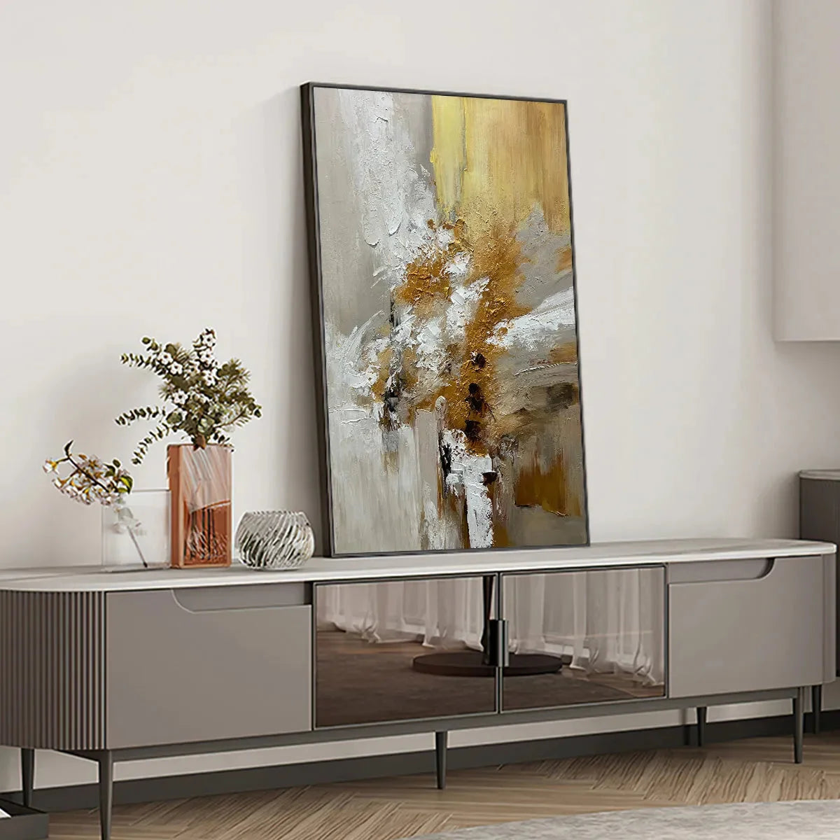 GOLDEN WHISPERS: Textured Abstract Painting in Beige, White, and Gold | black frame version on white wall