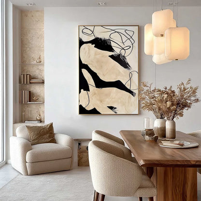 INTERTWINED: Large Vertical Minimalist Black and Beige Abstract Painting | gold frame stretched on neutral wall