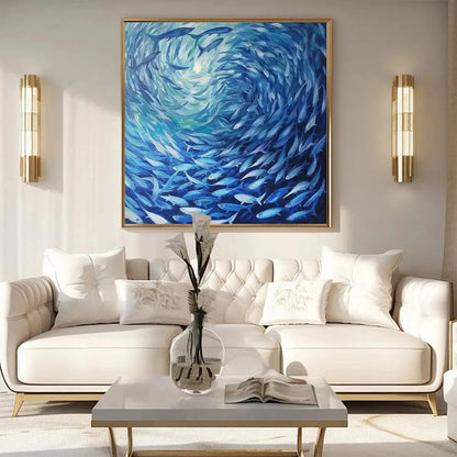 OCEANIC WHIRL: Dynamic Painting of a School of Fish | gold frame stretched on neutral wall
