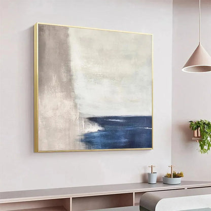 SERENE SHORE: Minimalist Abstract Coastal Painting in Blue and Beige | black frame version on white wall