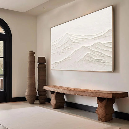 WHISPERING PEAKS: Textured Minimalist White Mountain Painting | black frame version on white wall